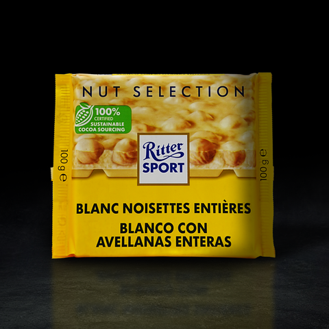 CHOCOLATE BLACO RITTER SPORT CON AVELLANAS ENTERAS 100G